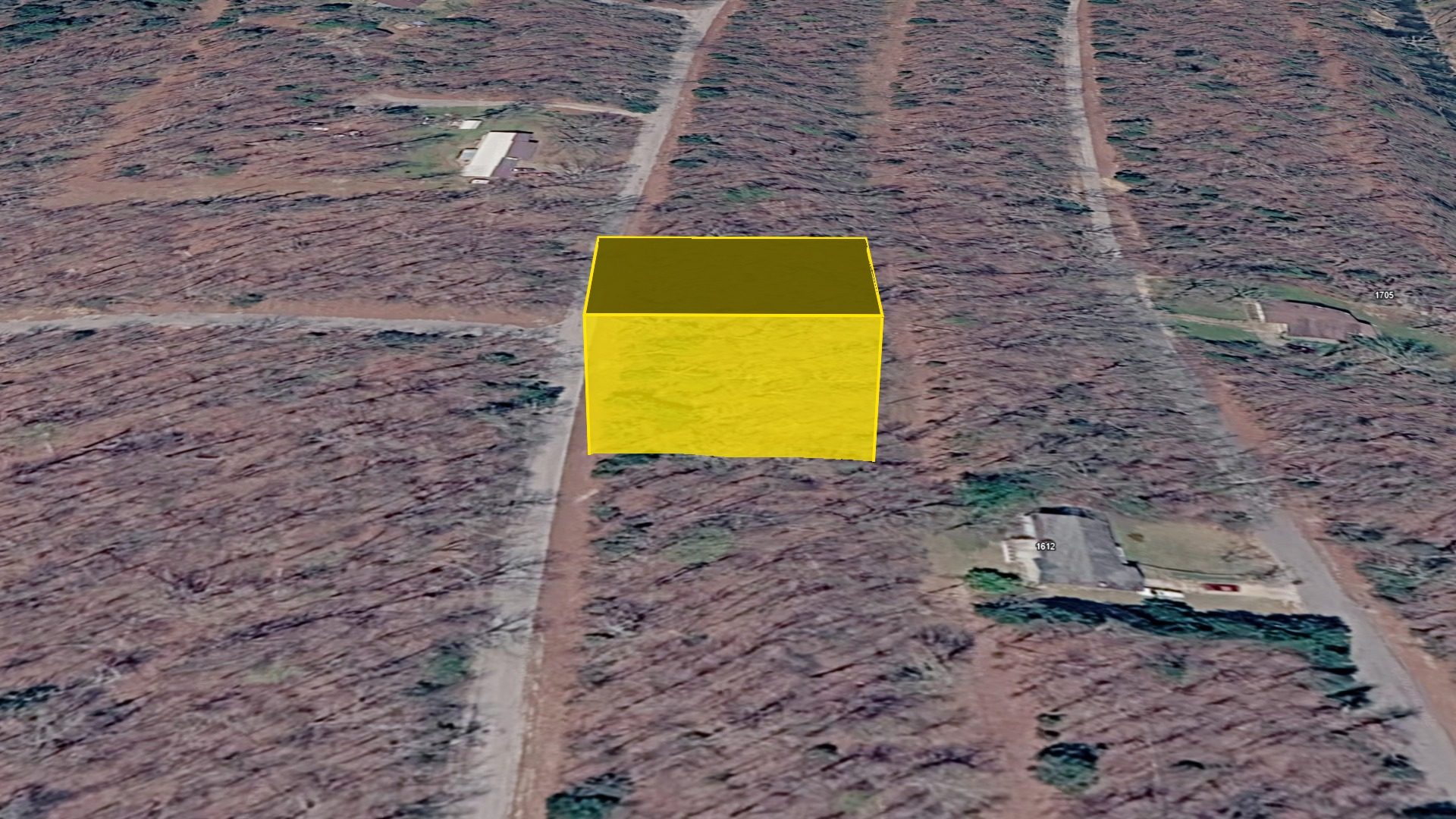 3D aerial view of Lot 32 with the parcel boundary raised above the terrain, looking west toward the neighborhood